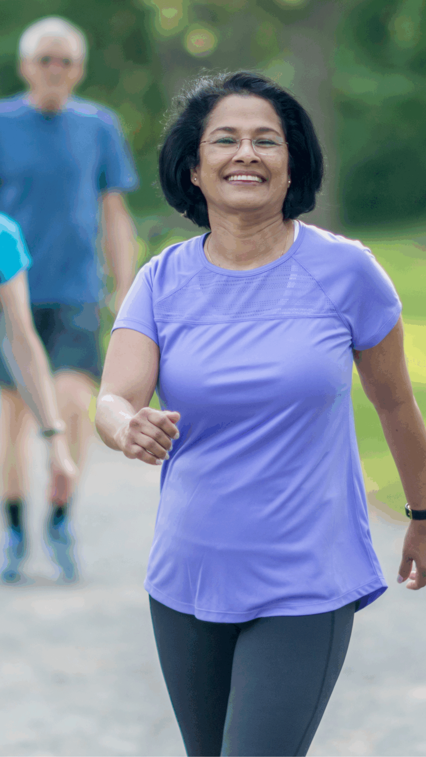 Woman walking outdoors for physical activity that helps maintain healthy blood sugar levels.