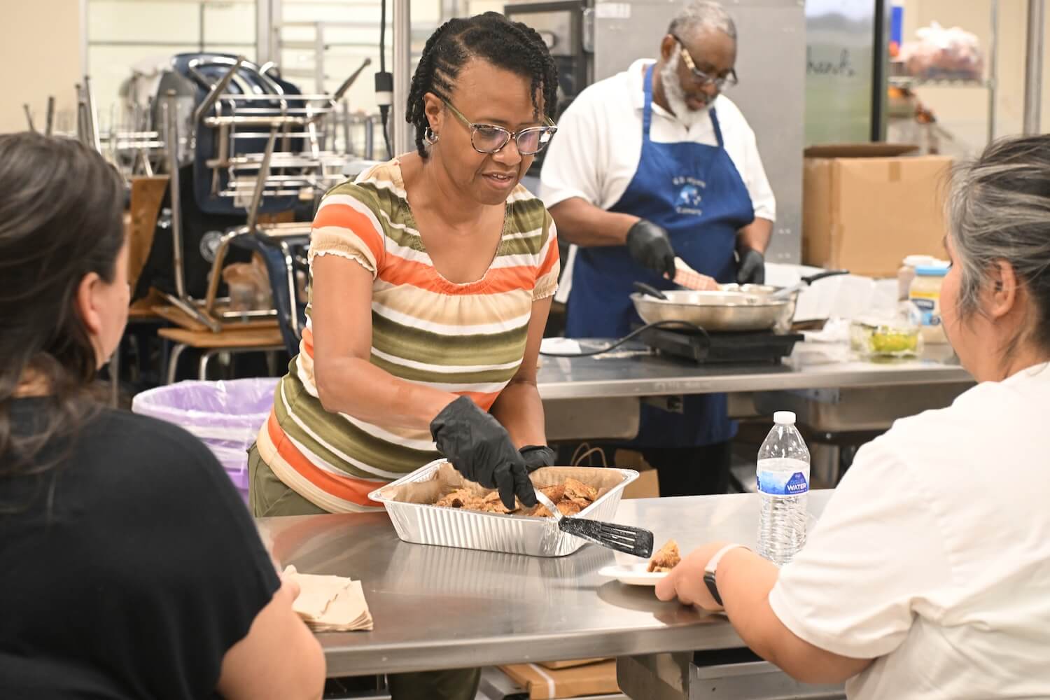 Cooking demonstration at a health and healing hubs event